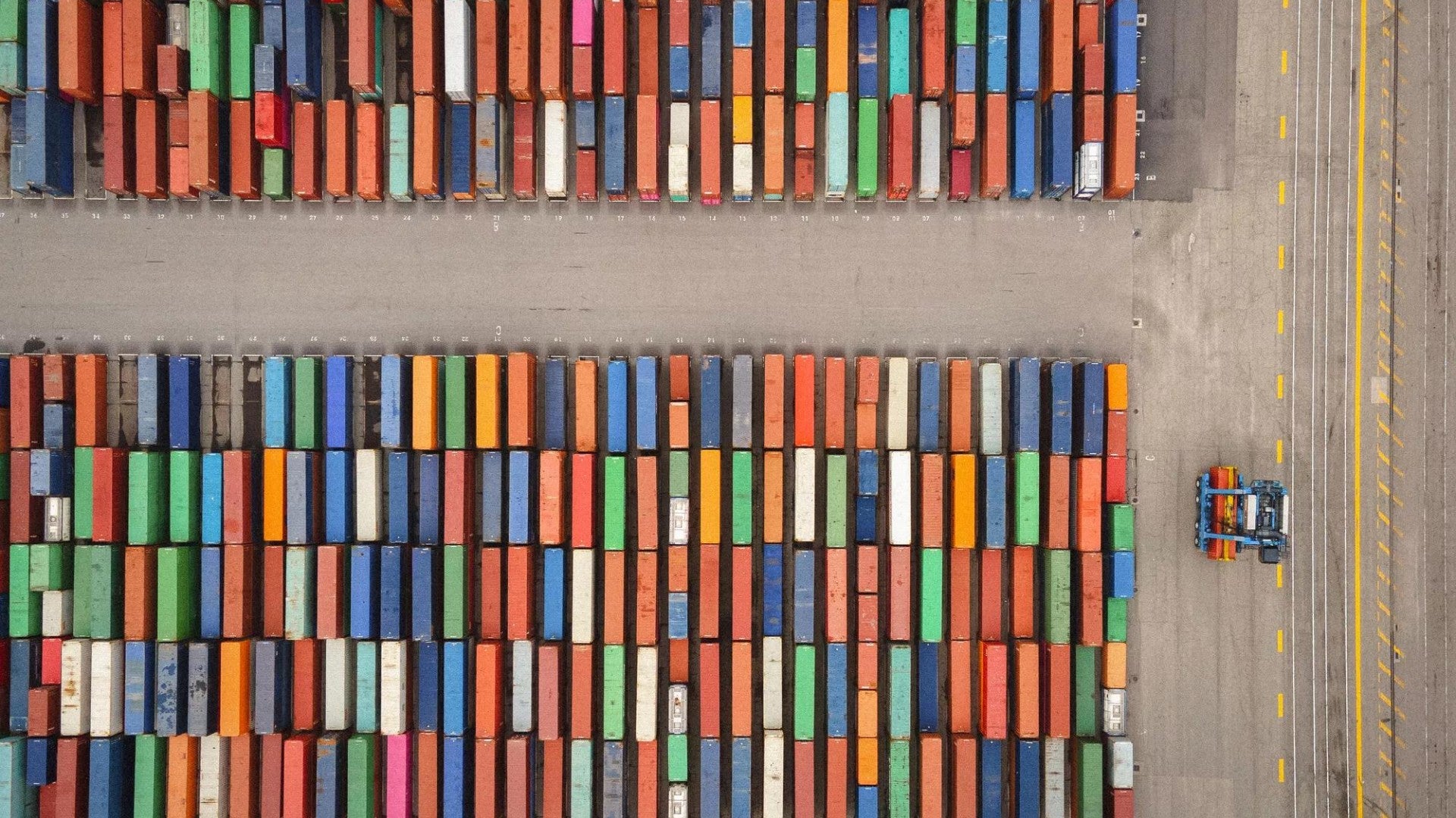 An aerial view of many shipping containers.